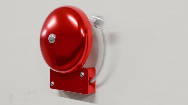 Red school bell rings on school wall 