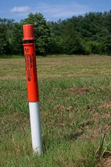 Underground fiber optic cable post