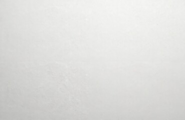 Obraz premium Watercolor paper texture background with subtle imperfections. Blank canvas sheet, parchment cardboard surface. White paper texture for art, scrapbooking, memos, notes, invitations, print templates.