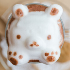 A cup of coffee with cute latte art