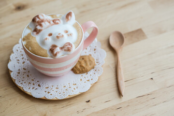 A cup of coffee with cute latte art