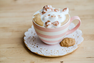A cup of coffee with cute latte art
