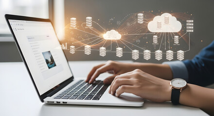Hands Typing on a Laptop with a Holographic Display Illustrating Cloud Computing Infrastructure and Data Storage Networks