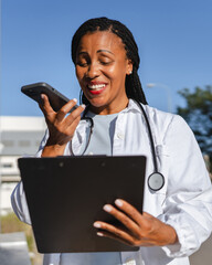 african american woman doctor reports results to the patient