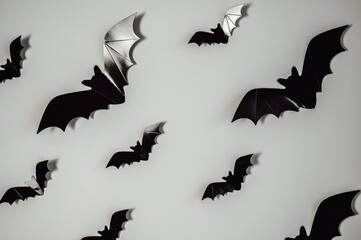 flying black bats for Halloween decoration. Festive background