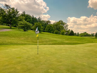 Obraz premium Summer views of beautiful golf course fairway. Located within Forest Park in St. Louis, Missouri, USA.