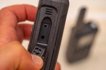 Close-up of two-way radio port and audio jacks