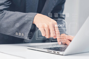 E-Invoice and Digital billing concept, Invoice, Businessman using laptop to manage electronic statements virtual screen. E-tax, Digital receipt, Online invoice processing and tax accounting solutions.