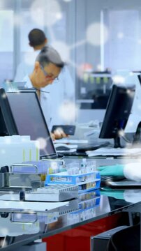 Animation of molecules over diverse scientists working in lab