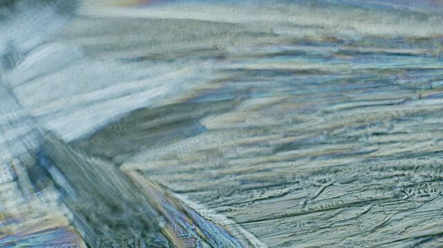 Copper sulphate crystals growing under microscope in polarized light