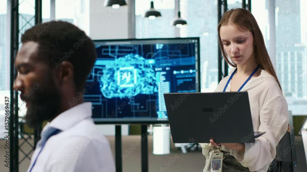 Poster portrait of smiling female engineer coding with ai language model assistance in startup office, usin