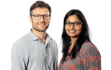 Caucasian man and South Asian woman working together on a collaborative project isolated on transparent background PNG