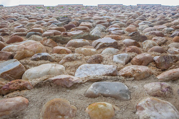 Galisteo wall detail built with Jerte River pebbles, Spain