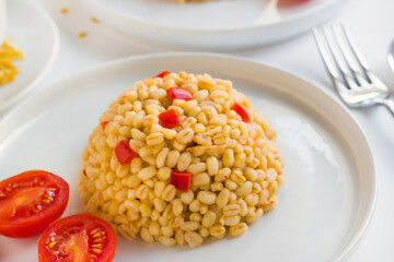 Traditional local bulgur pilaf from the Mardin city of Turkey.Designed in white plates