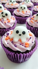 Adorable Halloween ghost cupcakes, beautifully decorated and ready to delight guests at a festive Halloween party.