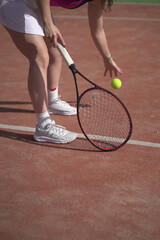 beautiful young woman playing tennis and possing outdoors, no edited image