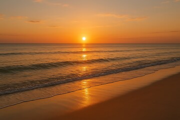 Obraz premium Calm Beach at Sunset with Golden Reflections on Water