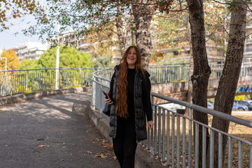 Unedited Portrait of a Young Woman Walking in the City – Facial Expressions Showing Various Emotions