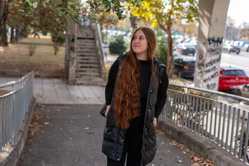 Unedited Portrait of a Young Woman Walking in the City &ndash; Facial Expressions Showing Various Emotions