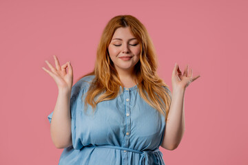 Tranquil overweight woman relaxing, meditating, stress. Body positive lady