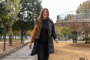Fototapeta premium Unedited Portrait of a Young Woman Walking in the City – Facial Expressions Showing Various Emotions