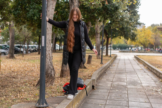 Unedited Portrait of a Young Woman Walking in the City &ndash; Facial Expressions Showing Various Emotions