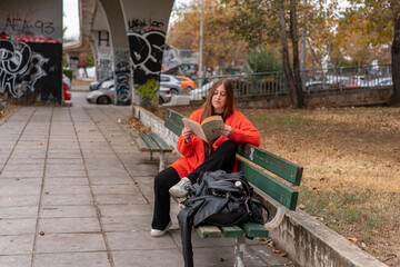 Unedited Portrait of a Young Woman Walking in the City – Facial Expressions Showing Various...