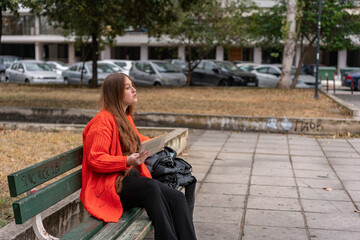 Unedited Portrait of a Young Woman Walking in the City – Facial Expressions Showing Various...