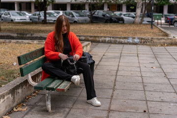 Unedited Portrait of a Young Woman Walking in the City – Facial Expressions Showing Various...