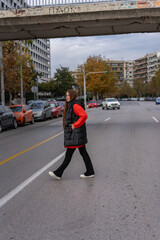 Unedited Portrait of a youn Woman walking around the city. Face Expressing Various Emotions 