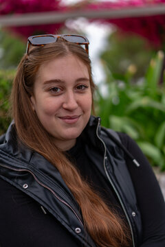 Unedited Portrait of a youn Woman walking around the city. Face Expressing Various Emotions 