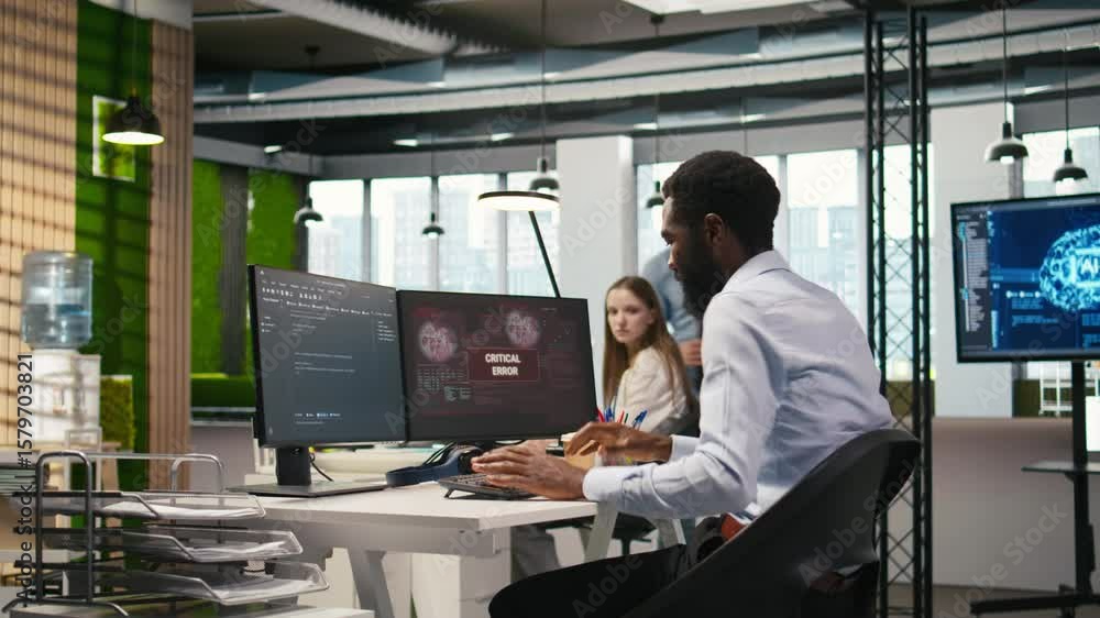 Poster programmer in office requesting help from coworkers to fix critical error warning. it employee and c