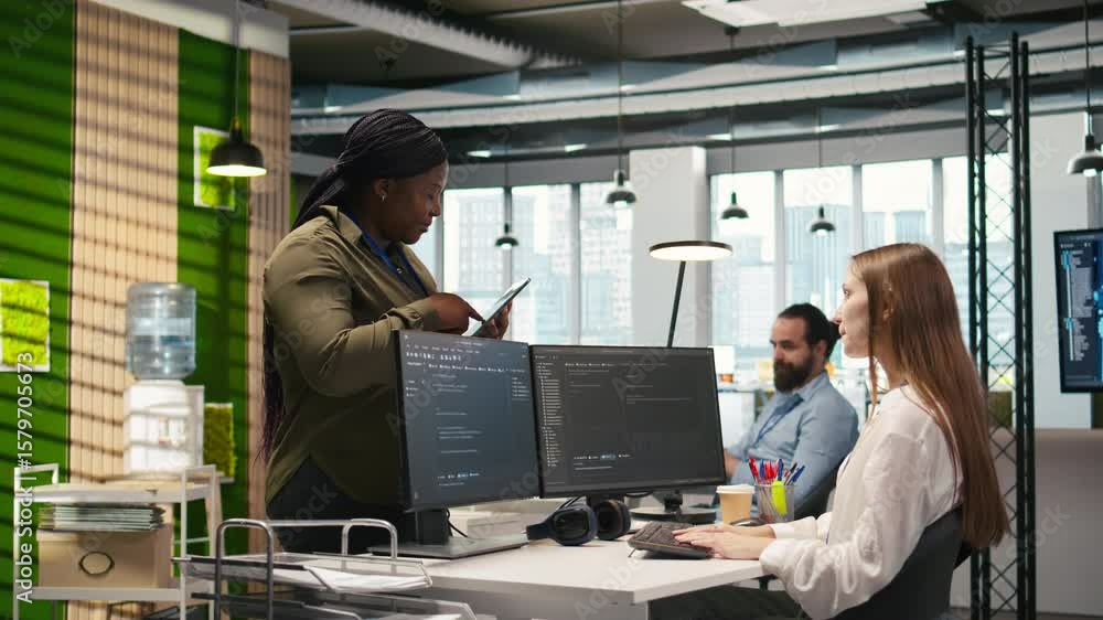 Poster friendly coworkers helping junior dev code ai algorithms to debug software issues and improve system