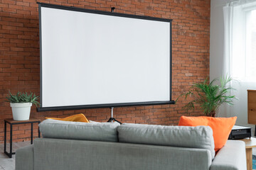 Interior of room with projector screen and sofa
