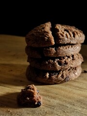 Chocolate Cookies on Wooden Surface with Shadows