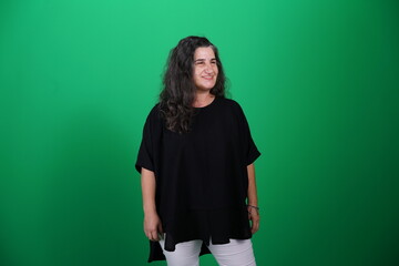 Unedited Portrait of Woman’s Face Expressing Various Emotions – Green Studio Background