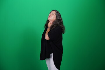 Unedited Portrait of Woman’s Face Expressing Various Emotions – Green Studio Background