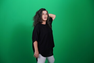 Unedited Portrait of Woman’s Face Expressing Various Emotions – Green Studio Background