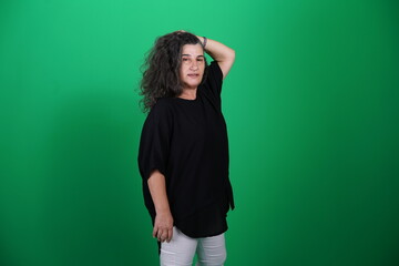 Unedited Portrait of Woman’s Face Expressing Various Emotions – Green Studio Background