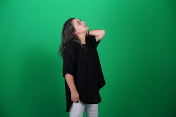 Unedited Portrait of Woman’s Face Expressing Various Emotions – Green Studio Background