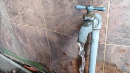 water flowing from the tap, clear and clean for daily household needs, humans depend on water for life