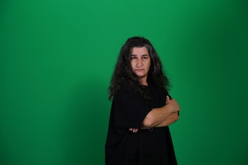 Unedited Portrait of Woman’s Face Expressing Various Emotions – Green Studio Background