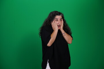 Unedited Portrait of Woman’s Face Expressing Various Emotions – Green Studio Background