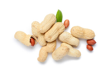 Many unpeeled and peeled peanuts with leaf on white background