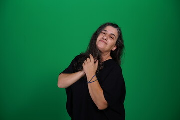 Unedited Portrait of Woman’s Face Expressing Various Emotions – Green Studio Background