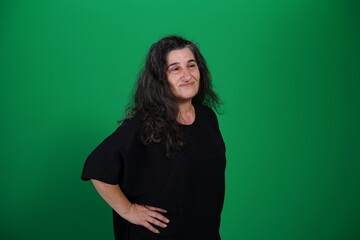 Unedited Portrait of Woman’s Face Expressing Various Emotions – Green Studio Background