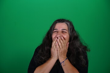 Unedited Portrait of Woman’s Face Expressing Various Emotions – Green Studio Background