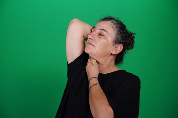 Unedited Portrait of Woman’s Face Expressing Various Emotions – Green Studio Background