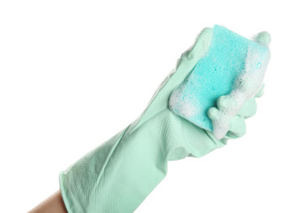 Hand in rubber glove holding sponge for cleaning on white background