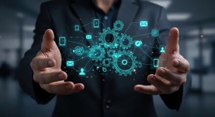 Photo of a digital network of gears and icons floats above open hands